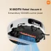 Underside view of Xiaomi Robot Vacuum 6 showing brushes, wheels, and 30,000Pa suction airflow.