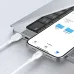 Close-up of the white BWOO BO-X286C cable connecting a smartphone to a laptop's USB-A port.