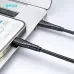 Close-up of a phone and a laptop connected by the black, braided BWOO BO-X318CL cable for file transfer.