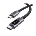 Close-up of the ends of a black Ugreen L528 USB-C to USB-C cable, showing the gray metal connectors.