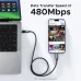 A smartphone and a laptop connected by the Ugreen Uno 100W USB-C cable, highlighting its 480Mbps data transfer speed.