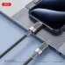 Close view of XO NB-Q282B 1M Type-C to Type-C Cable connected to smartphone showing sleek connector and cable design