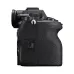 Left side view of Sony a7 V Mirrorless Camera showing grip, control dials, and compartment door labeled open.