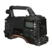 Angled rear view of the black Panasonic AJ-PX380 P2HD broadcast camcorder with controls and screen.