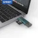 Onten OTN-CR532 Type-C & USB-A Card Reader plugged into a laptop USB port showing compact card reading use.