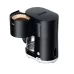 Front view of Braun Breakfast1 KF1100 Coffee Maker with open filter basket, paper filter, and glass carafe below.