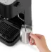 Side view of DeLonghi EC230 Stilosa Coffee Machine frothing milk in pitcher with steam wand for cappuccino.