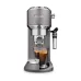 Front view of DeLonghi EC785 Dedica Metallics Coffee Maker dispensing espresso into glass cup with sleek metallic design.