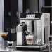 Lifestyle view of DeLonghi ECAM650-85 Primadonna Elite Coffee Machine on counter brewing cappuccino with digital display.