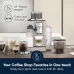 Lifestyle view of DeLonghi EXAM440.55 Rivelia Coffee Machine on kitchen counter brewing multiple preset café-style drinks.
