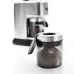 DeLonghi KG521 Dedica coffee grinder with ground coffee container and stainless steel finish.
