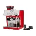 DeLonghi La Specialista Arte espresso machine steaming milk with a stainless steel pitcher.