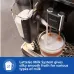 Close-up of Philips EP2230/10 2200 Series Coffee Machine with LatteGo Milk System frothing milk into glass cup.