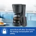 Kitchen view of Philips HD7430/90 Coffee Maker with glass carafe, steam rising, and auto shut-off feature highlighted.