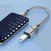 Close-up view of BWOO BO-BZ70 Lightning to USB-A Converter connected to smartphone with pendrive read data 