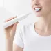 Usage view of Hoco HP64 Acoustic Wave Electric Toothbrush showing brushing action with slim handle design