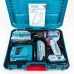 Tool kit view of TOTAL TIDLI20668 Drill Machine with dual batteries, charger, and manual inside teal case.