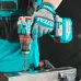 Workshop action of TOTAL TIDLI426982 Drill Machine drilling into metal with gloved hands and clamped workpiece.