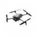 A grayscale image of the DJI Mini 5 Pro Fly More Combo drone from a slight top-down angle, showing its propellers and camera.