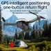 Low-angle view of the U6 Toy Drone flying over a camping tent in a forest toward a mountain.