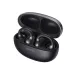 Angled view of the Edifier Comfo Bass Open-ear Earbuds stored inside an open charging case.