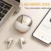 Desk setup view of Onikuma TX610 ANC Wireless Earbuds placed beside laptop and smartphone highlighting wireless connection and usage scenario