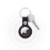 Apple AirTag (2nd Gen) hooked with a key ring showing its compact size
