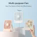 Lifestyle view of the Jisulife Life1 FA26 Portable Ultra‑Slim Desk Fan used as a handheld and desk fan in multiple ways.