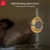 Night usage view of Xundd XDOT-063 Multi Functional Clip Fan beside bed showing soft lighting and airflow