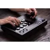 Front angled view of 8BitDo Arcade Stick in use with player pressing buttons and gripping joystick.