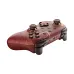 Angled view of 8BitDo Ultimate 2 Wireless Wuchang Controller in red with gold artwork and black shoulder buttons.