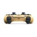 Gold DualSense 007 First Light controller angled view showing ergonomic grip, buttons and premium textured finish
