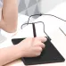 Huion HS64 Graphics Tablet shown in use with a stylus connected to a smartphone.