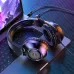 Hoco W108 Sue Wired Gaming Headphone placed on laptop showing RGB lighting earcups and wired gaming setup