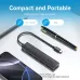 The Vention CHYBB USB-C hub next to a pen, illustrating its compact, pen-sized, and 32g portable design.