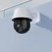 Angled view of Meari S7 Plus PTZ WiFi Camera on light blue wall showing sleek dome body with multiple lenses.