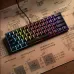 Top view of compact 60 percent mechanical keyboard with RGB backlight placed on technical drawing surface