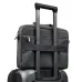 Rear view of BWOO BO-CB46 15.6 Inch Laptop Backpack mounted on suitcase handle showing travel-friendly design and straps