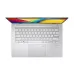 Above view of ASUS Vivobook Go 14 E1404FA Laptop keyboard and touchpad with screen displaying ASUS Vivobook text.