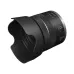 Side view of Canon RF 24-50mm f/4.5-6.3 IS STM Lens with lens hood attached and visible control switches.