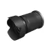 Angled view of Canon RF-S 18-150mm f/3.5-6.3 IS STM lens with attached petal-style lens hood