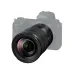 Angled view of Nikon NIKKOR Z 24-120mm f/4 S lens mounted on a transparent outlined Nikon Z camera body