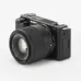Angled view of the black Viltrox AF 56mm F1.7 Air APS-C lens mounted on a Sony Alpha mirrorless camera.