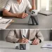 Joyroom JR-ZS432 MagSafe Card Holder, desk view showing magnetic wallet stand attached to smartphone in vertical position