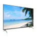 Dahua DHI-LM55-F400 displaying a tropical beach scene with white sand, turquoise water, and palm trees.