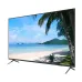 Dahua DHI-LM55-F400 display featuring a vibrant tropical beach scene with lush palm trees and calm turquoise waters.