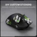 Close-up view of the black Onikuma DM01 Mouse showing customizable anti-slip honeycomb stickers.