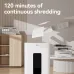 A white Deli paper shredder in an office setting with sheets of paper floating around it, advertising 120 minutes of continuous shredding.