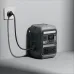 Front view of Anker SOLIX C300 Portable Power Station plugged into wall outlet showing digital display and ports.
