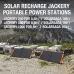 Outdoor landscape view of two Jackery SolarSaga 100W Portable Folding Solar Panels deployed in front of camper vans.